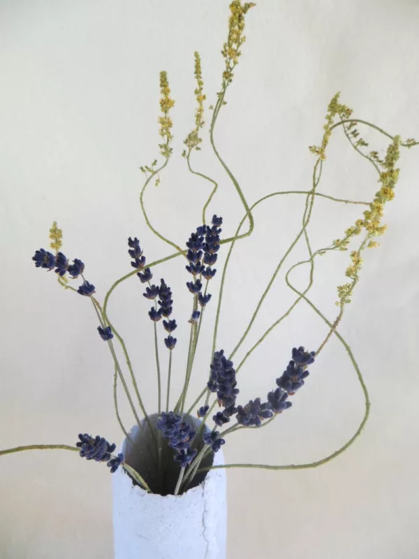 wild flowers in paper mache vase